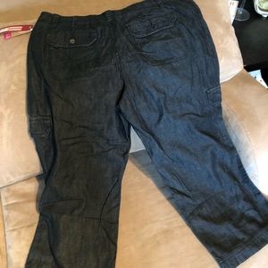 Dark wash denim capris.